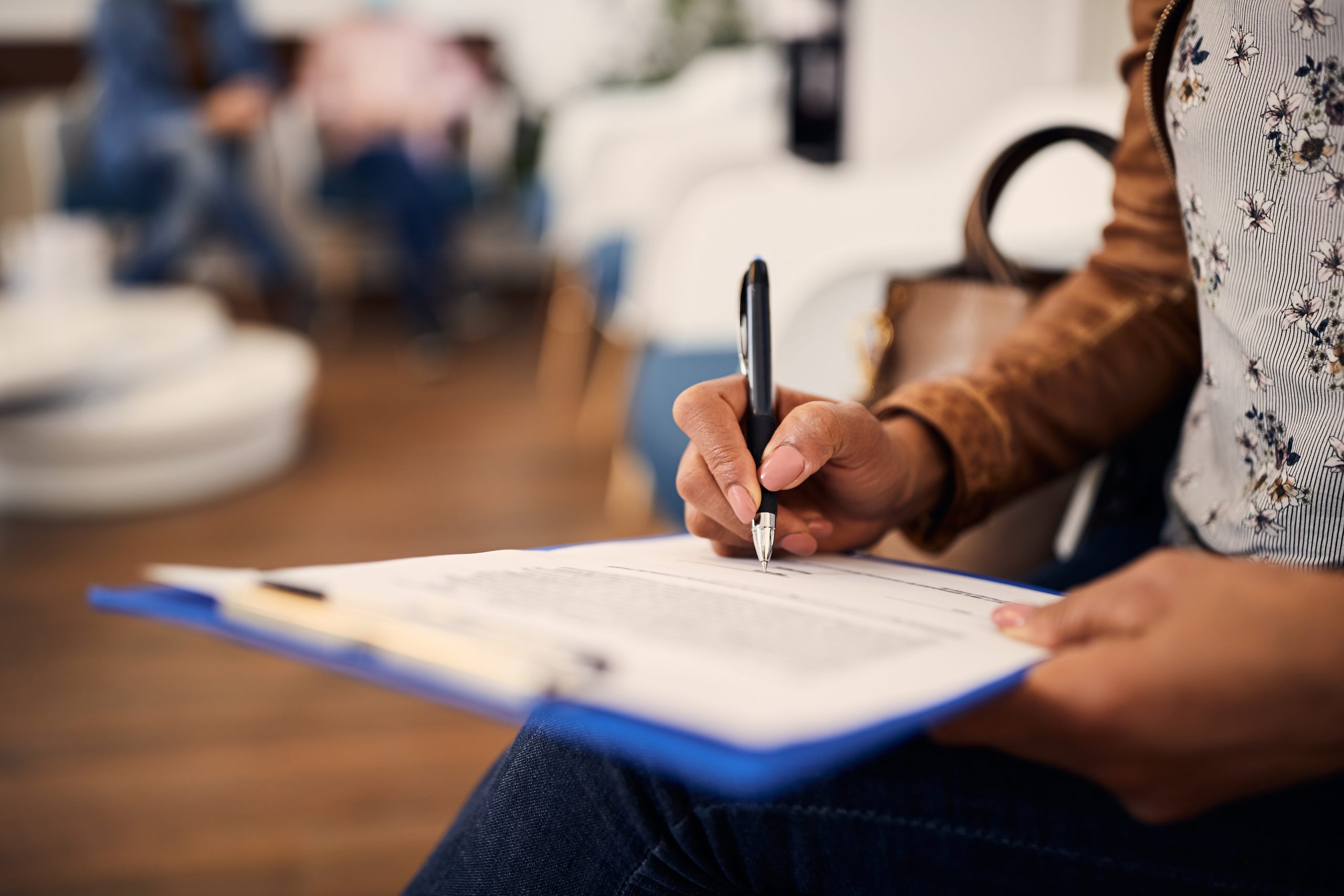 New patient filling out forms in a Coeur d’Alene ID Dental Clinic