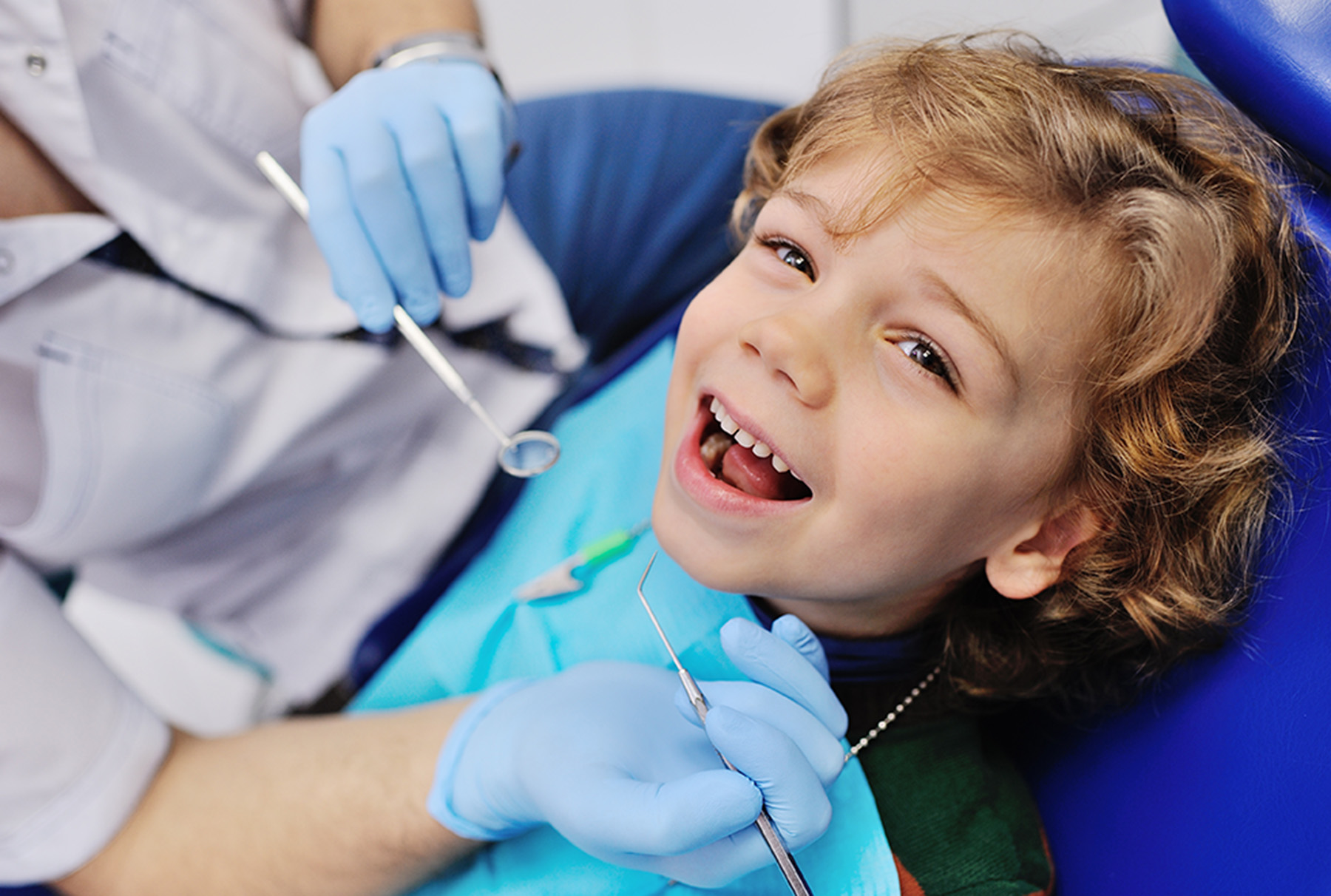 Child getting his regular dental exam in Coeur d'Alene, ID