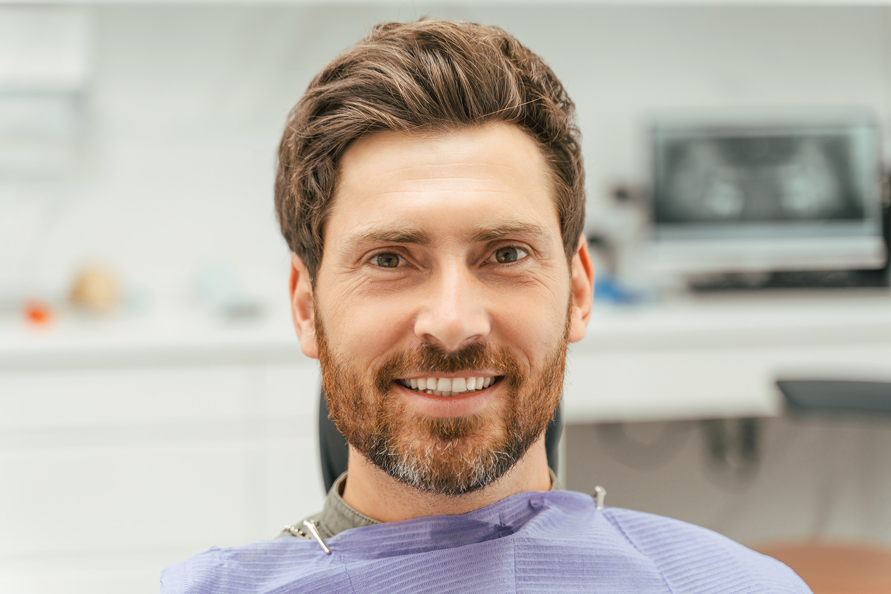 male dental patient considering veneers from scholes family dental