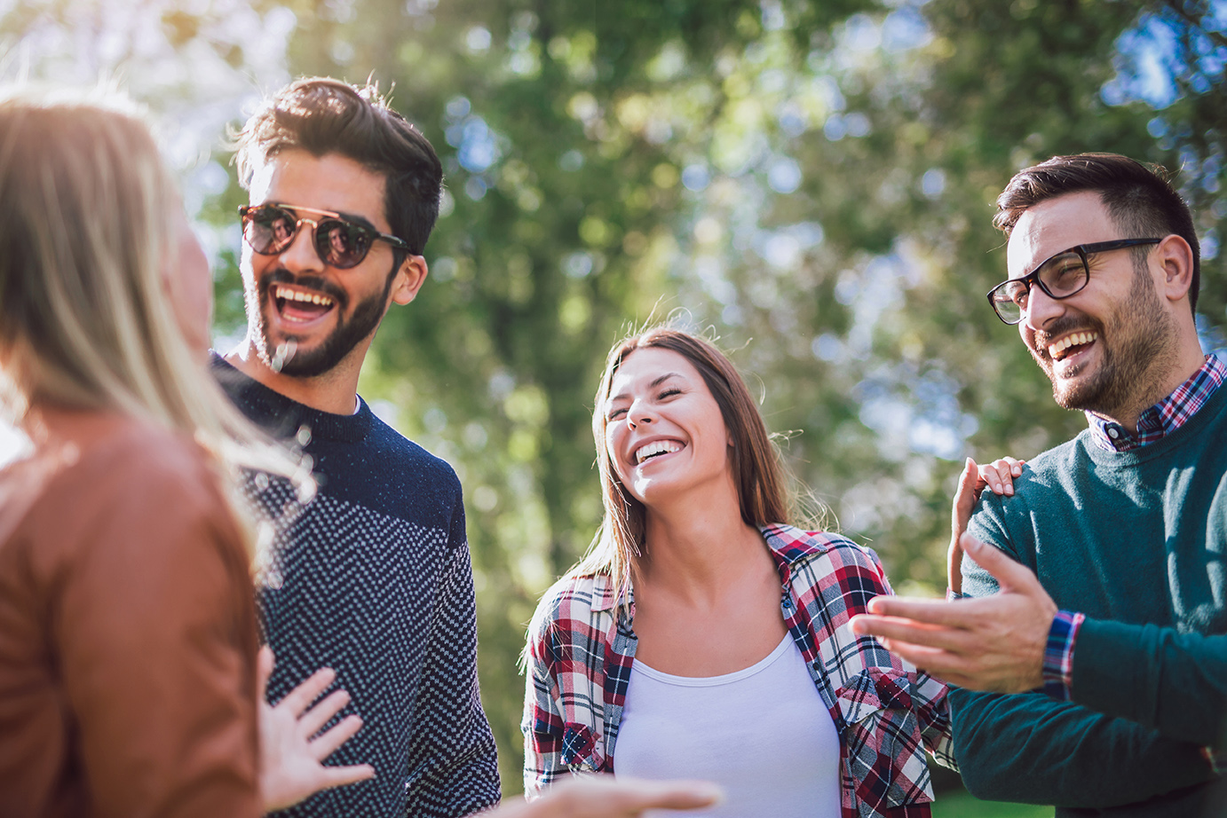 group of people laughing after dental filling in Coeur d’Alene, ID